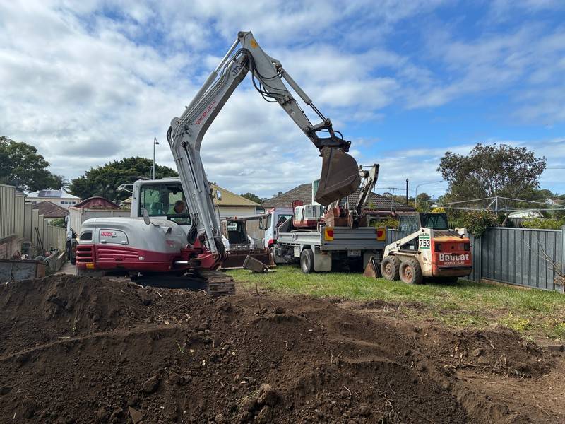 Sydney excavation, bobcat and tipper load-out - Allsites Excavations Excavator, bobcat and tip truck working on a Sydney excavation site
