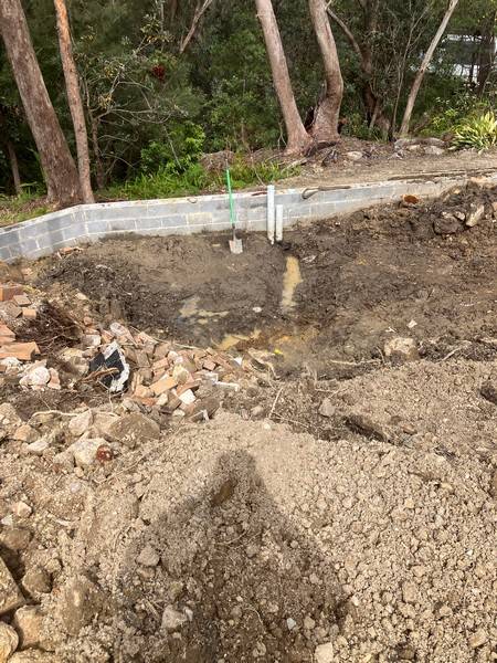 Backfill behind block wall - Allsites Excavations Sydney Backfill and drainage preparation behind a Sydney block retaining wall
