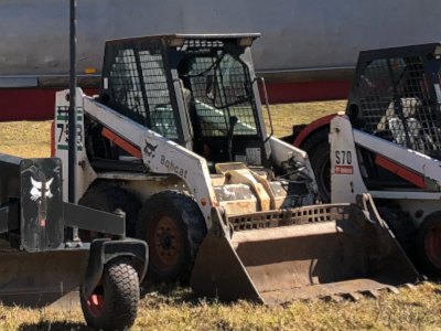 Bobcat 753 hire Sydney for excavation clean up Bobcat 753 with 4 in 1 bucket for excavation clean up and material handling in Sydney